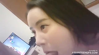 Small-titted Chinese GF in morose outfit gets fucked